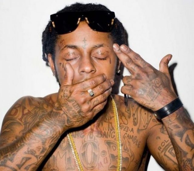 Lil Wayne’s Tattoos House Illuminati Cars